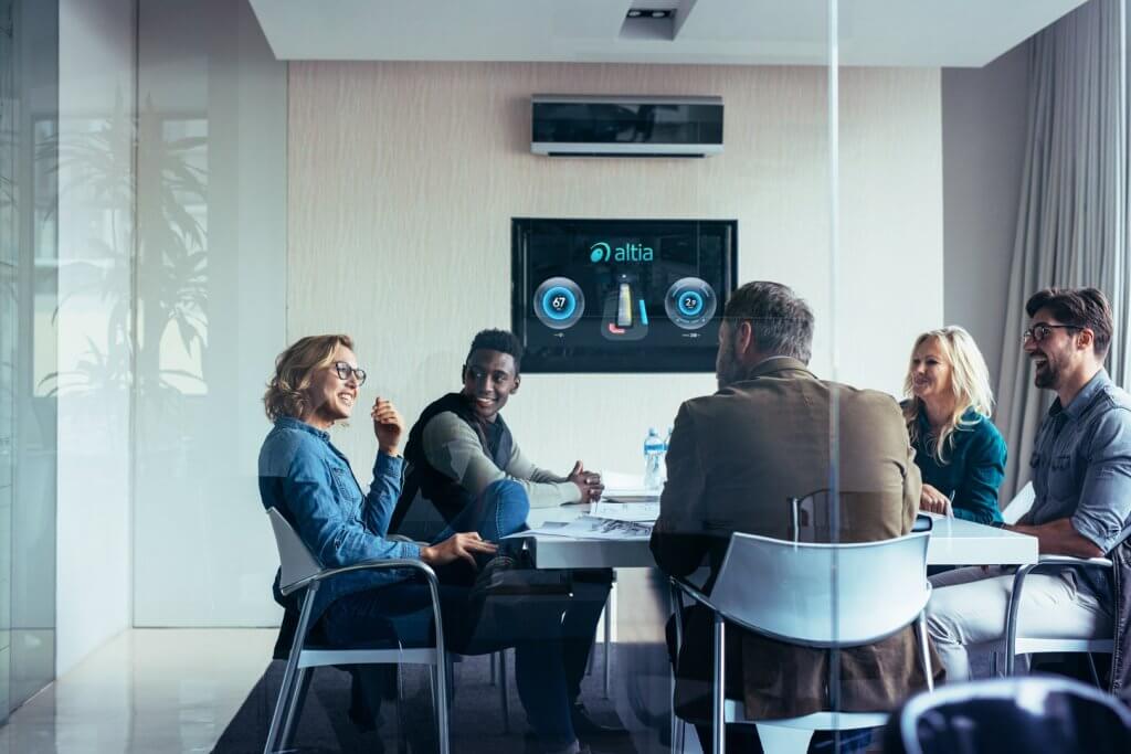 Altia team members in meeting room