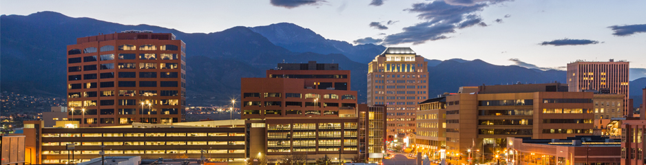 View of Colorado Springs downtown with mountains in background